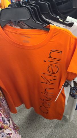 Calvin Klein · Оранжевая футболка с логотипом
