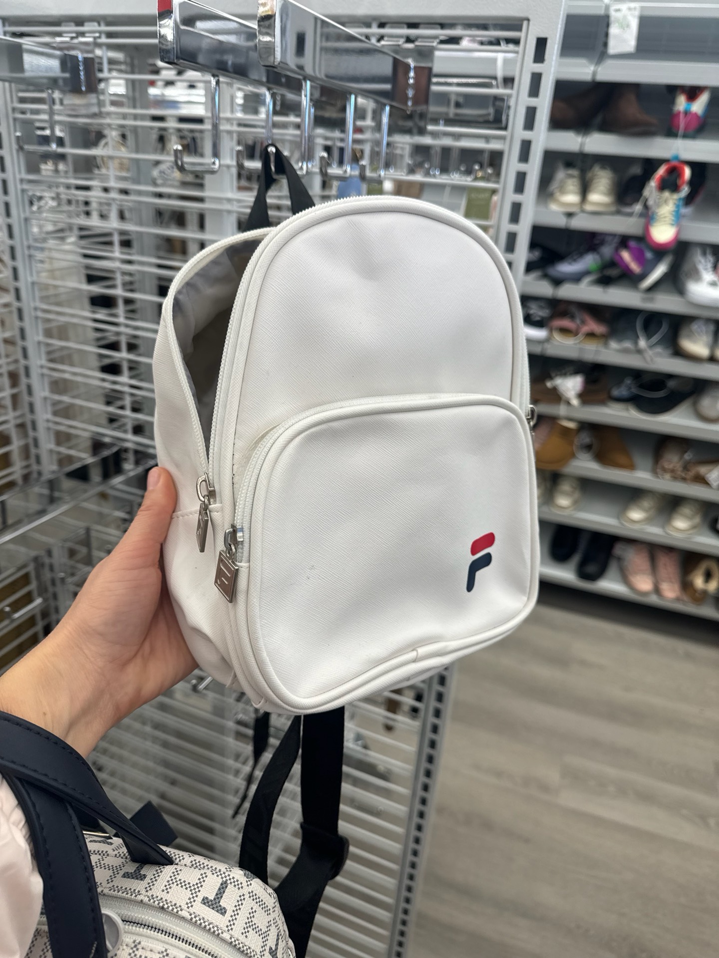 белый мини-рюкзак бренда FILA 